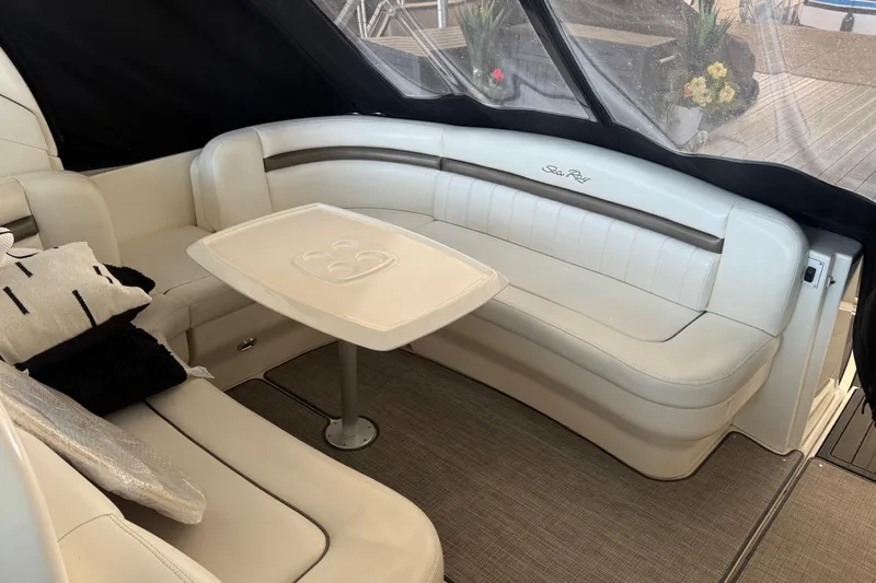  Yacht Photos Pics Luxurious interior of 2007 Sea Ray Sundancer 400 yacht with plush seating and table.