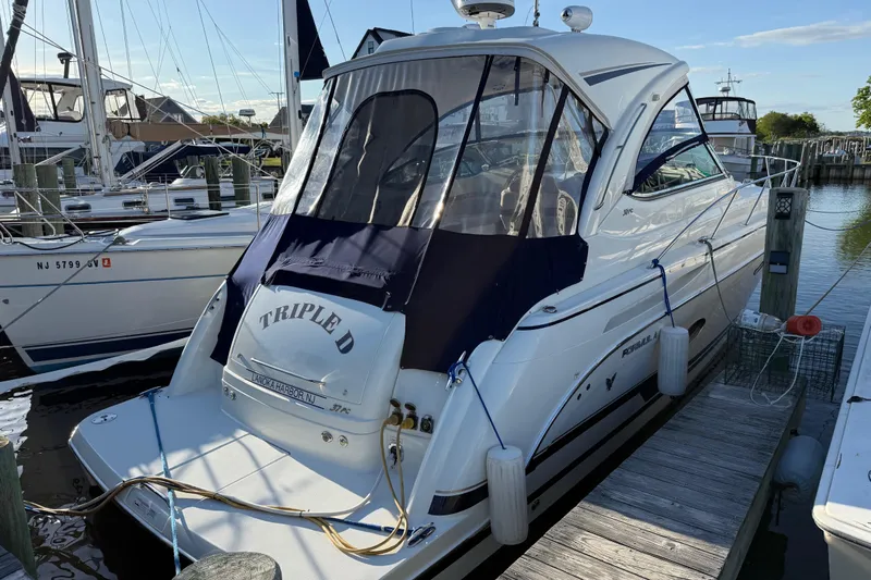  Yacht Photos Pics 2016 Formula 37 Performance Cruiser docked at marina, featuring sleek design and navy canopy.