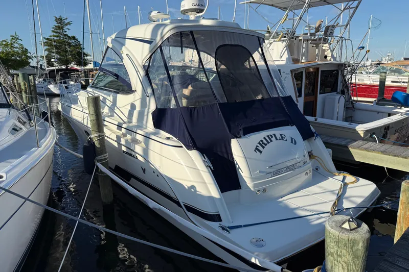  Yacht Photos Pics 2016 Formula 37 Performance Cruiser docked at marina, featuring sleek design and covered cockpit.