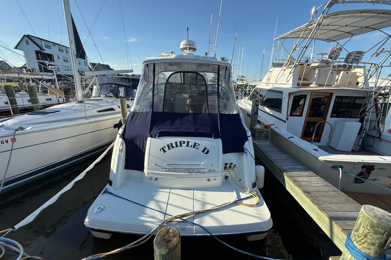  Yacht Photos Pics 2016 Formula 37 Performance Cruiser docked at marina, surrounded by other boats.