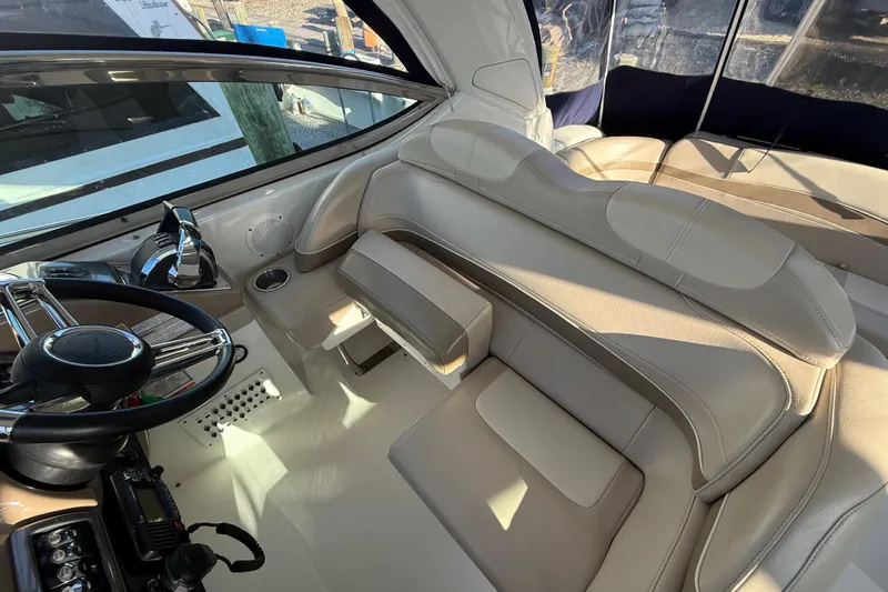  Yacht Photos Pics Interior of 2016 Formula 37 Performance Cruiser with beige seating and steering wheel.