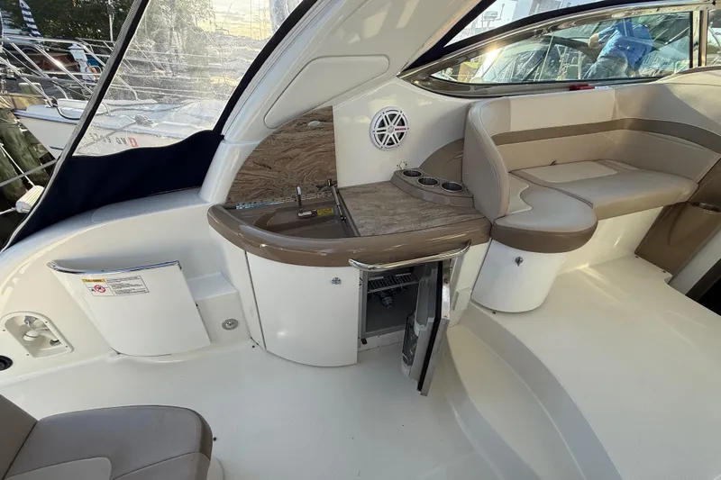  Yacht Photos Pics 2016 Formula 37 Performance Cruiser interior with seating and mini bar area.