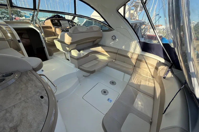  Yacht Photos Pics 2016 Formula 37 Performance Cruiser interior with beige seating and modern dashboard.