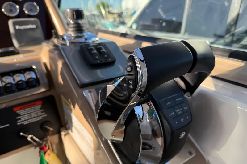  Yacht Photos Pics 2016 Formula 37 Performance Cruiser helm controls with throttle and navigation instruments.