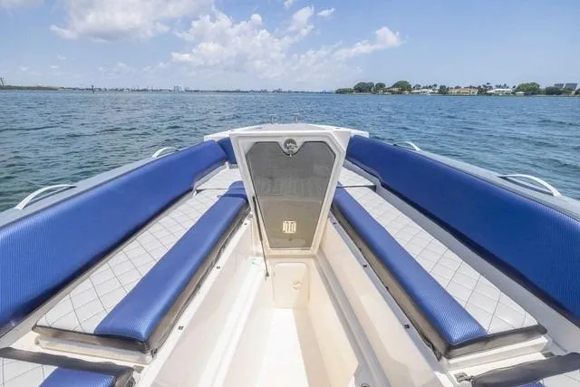  Yacht Photos Pics 2018 RIB CVL Colt 35 boat interior with blue seating on open water.