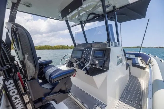 Yacht Photos Pics 2018 RIB CVL Colt 35 boat interior with modern controls and seating on water.