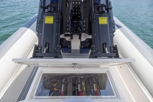  Yacht Photos Pics 2018 RIB CVL Colt 35 boat with open engine compartment on water.