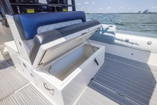  Yacht Photos Pics Open storage compartment on 2018 RIB CVL Colt 35 boat, with ocean view.