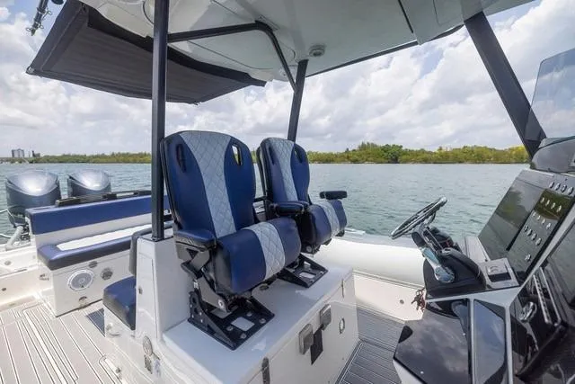  Yacht Photos Pics 2018 RIB CVL Colt 35 boat interior with dual seats and steering console.