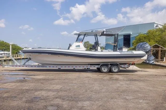  Yacht Photos Pics 2018 RIB CVL Colt 35 boat on trailer, dockside with clear skies.