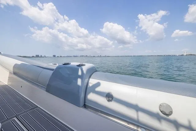  Yacht Photos Pics 2018 RIB CVL Colt 35 boat on calm water under a clear blue sky.