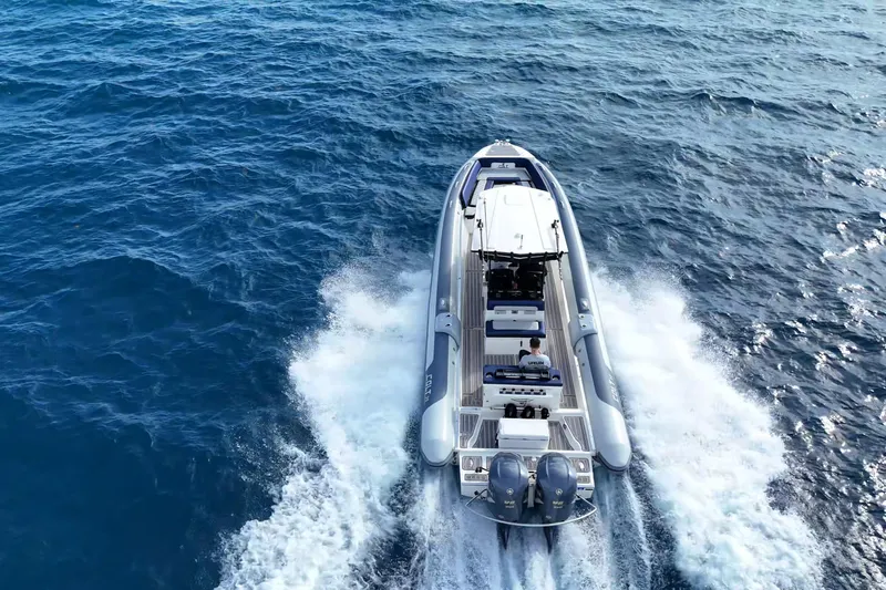  Yacht Photos Pics 2018 RIB CVL Colt 35 boat cruising on open blue sea, aerial view.