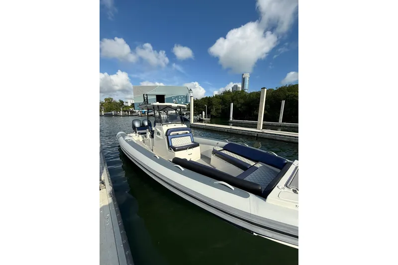  Yacht Photos Pics 2018 RIB CVL Colt 35 boat docked at marina under blue sky.