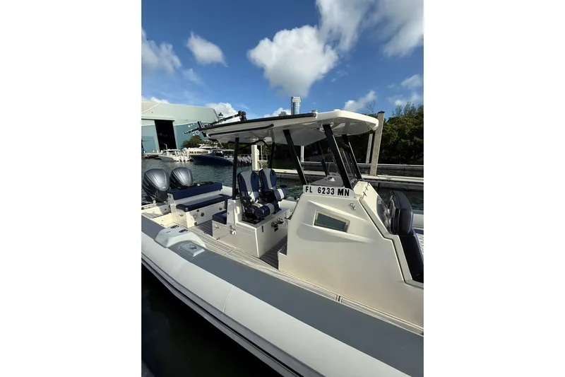  Yacht Photos Pics 2018 RIB CVL Colt 35 boat docked, featuring dual engines and sleek design.