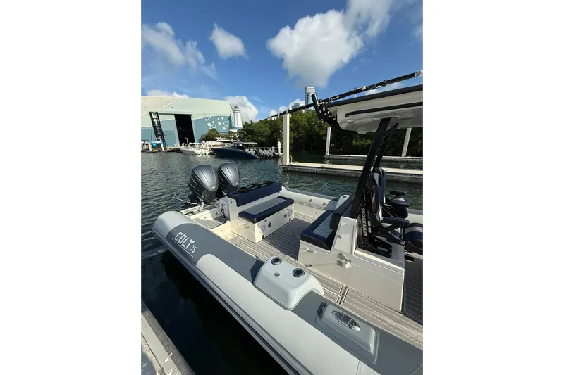  Yacht Photos Pics 2018 RIB CVL Colt 35 boat docked, featuring dual engines and sleek design under a blue sky.