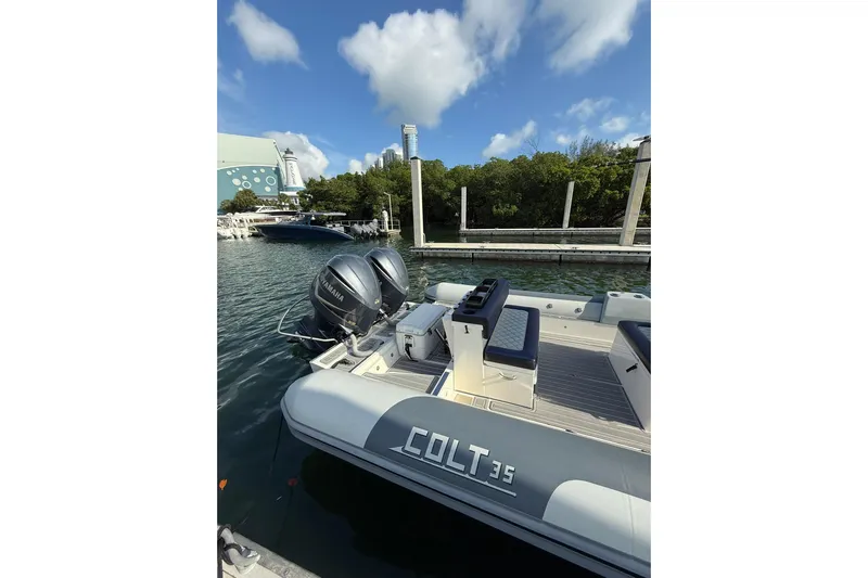  Yacht Photos Pics 2018 RIB CVL Colt 35 boat docked with dual Yamaha engines, clear sky background.