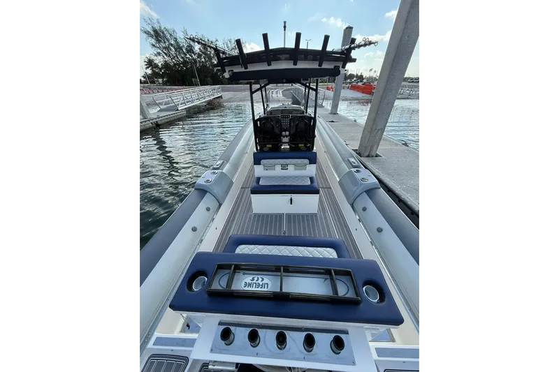  Yacht Photos Pics 2018 RIB CVL Colt 35 boat docked, featuring sleek design and modern seating arrangement.