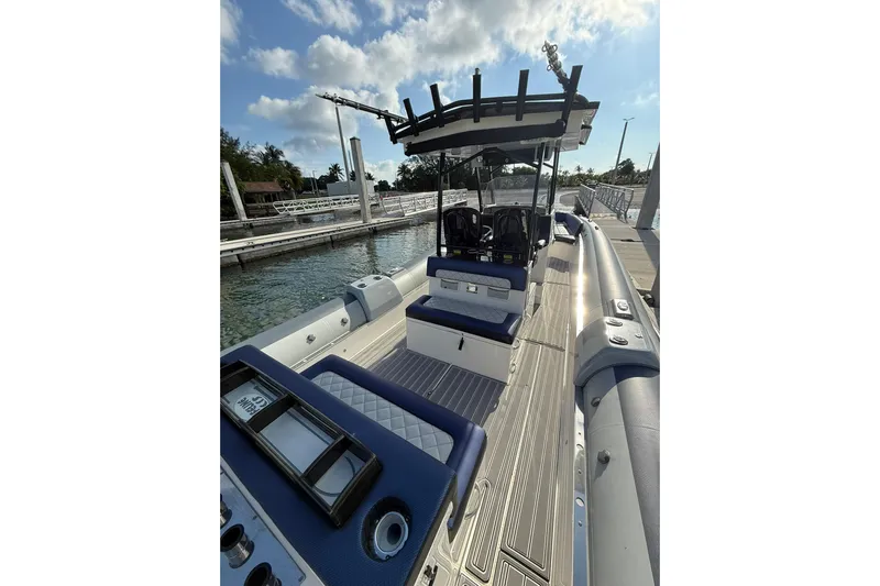  Yacht Photos Pics 2018 RIB CVL Colt 35 boat docked, featuring sleek design and modern seating.