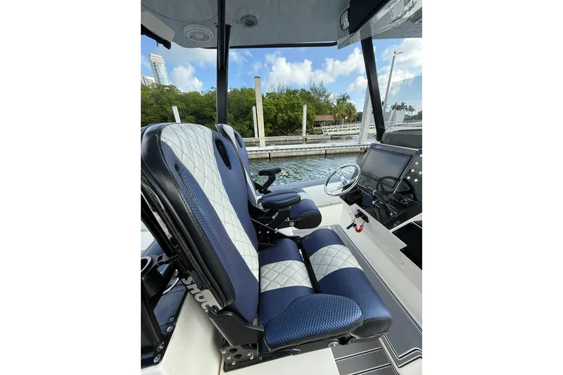  Yacht Photos Pics Interior of 2018 RIB CVL Colt 35 boat with blue and white seating.