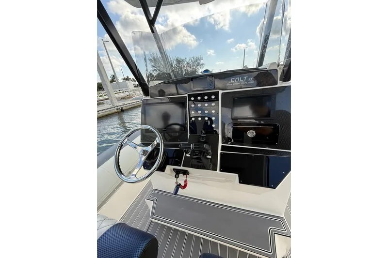  Yacht Photos Pics 2018 RIB CVL Colt 35 boat dashboard with steering wheel and control panel.