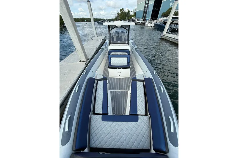  Yacht Photos Pics 2018 RIB CVL Colt 35 boat docked, featuring sleek seating and modern design.