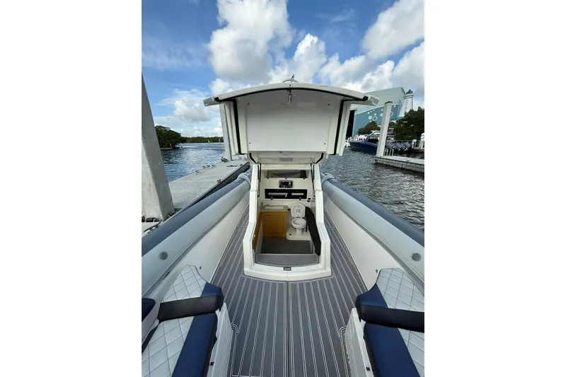  Yacht Photos Pics 2018 RIB CVL Colt 35 boat interior with open cabin and water view.