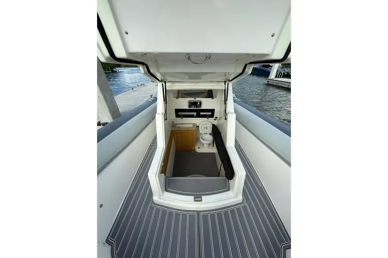  Yacht Photos Pics RIB CVL Colt 35 boat interior with toilet, docked by the water, 2018 model.