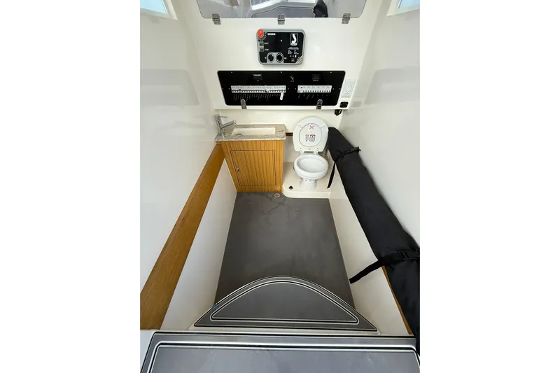  Yacht Photos Pics Interior of 2018 RIB CVL Colt 35 boat with toilet and control panel.