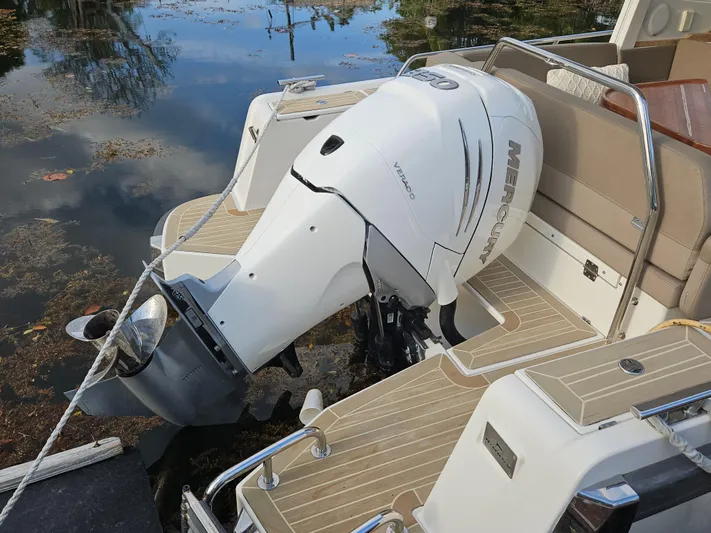  Yacht Photos Pics Nimbus Weekender 9 boat, 2020 model, with Mercury outboard motor on calm water.