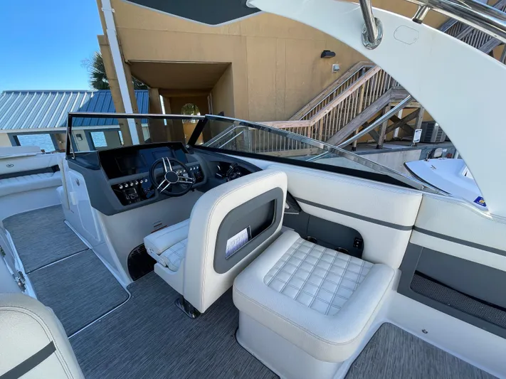  Yacht Photos Pics 2021 Cobalt 30SC Outboard boat interior with modern helm and seating.
