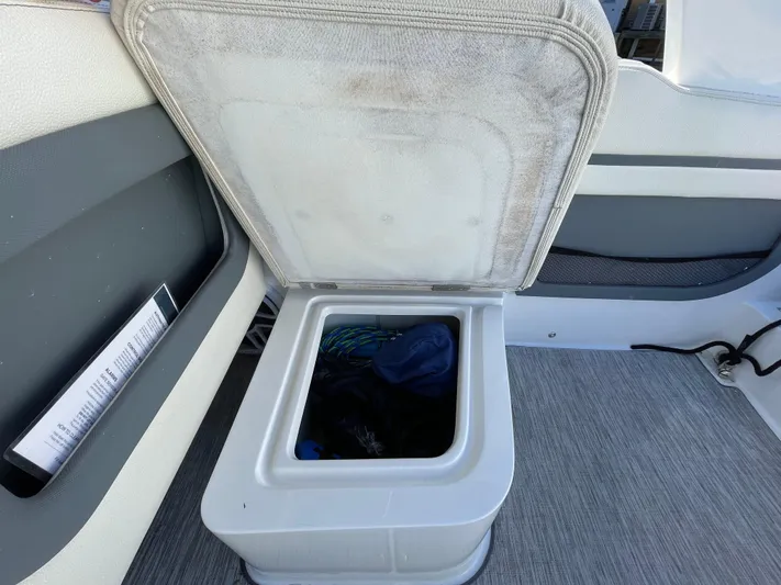  Yacht Photos Pics Open storage compartment on 2021 Cobalt 30SC Outboard boat interior.