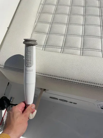  Yacht Photos Pics Cobalt 30SC Outboard 2021 boat seat with textured upholstery and hand grip.