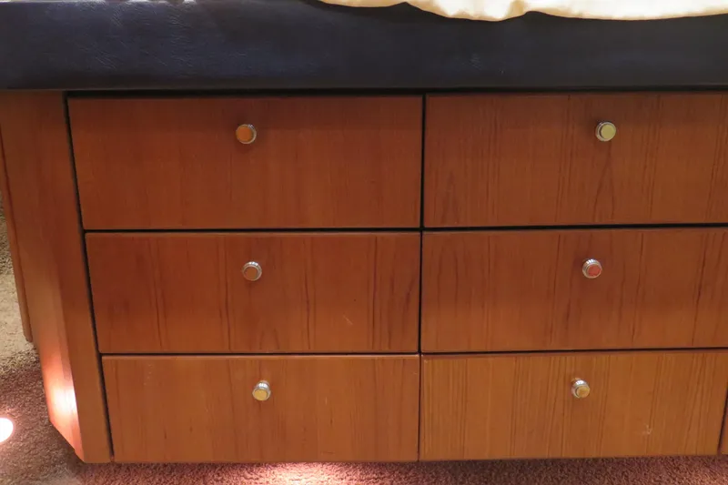 Mokikem Yacht Photos Pics Wooden drawers under berth.