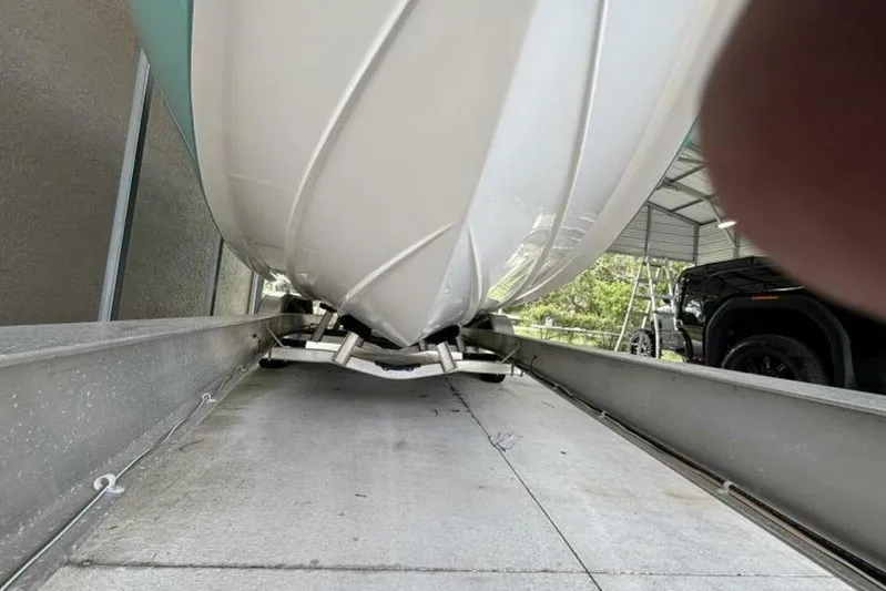  Yacht Photos Pics 2021 Sea Fox 288 Commander boat hull on trailer in covered storage.