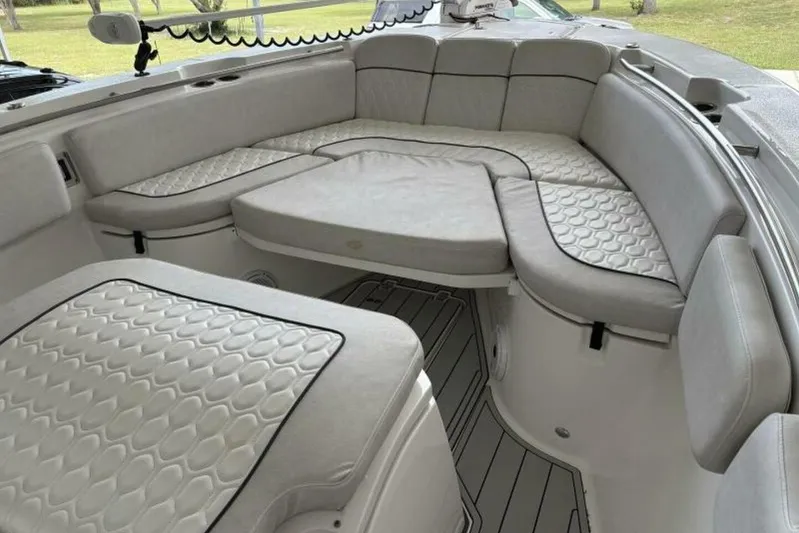  Yacht Photos Pics 2021 Sea Fox 288 Commander boat interior with cushioned seating and modern design.