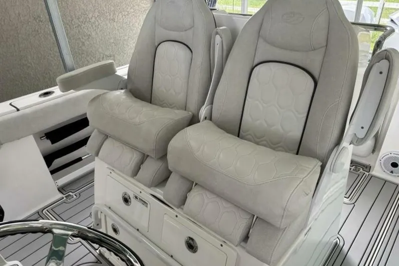  Yacht Photos Pics 2021 Sea Fox 288 Commander boat interior with plush seating and modern design.