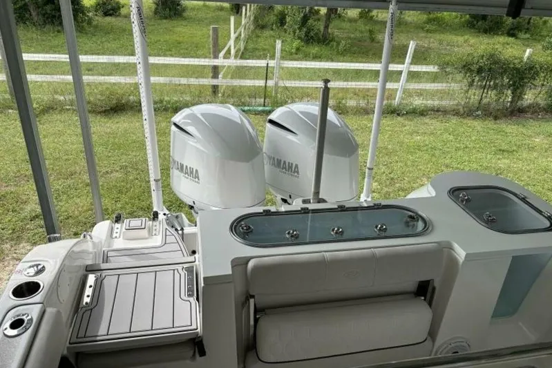  Yacht Photos Pics 2021 Sea Fox 288 Commander boat with dual Yamaha engines, outdoor setting.