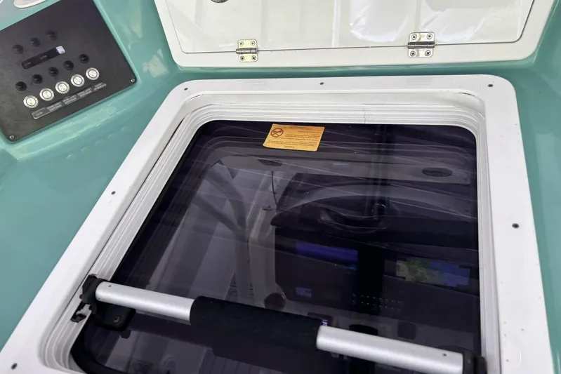  Yacht Photos Pics 2021 Sea Fox 288 Commander boat hatch and control panel detail.