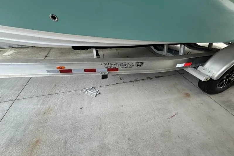  Yacht Photos Pics 2021 Sea Fox 288 Commander boat on trailer, side view.