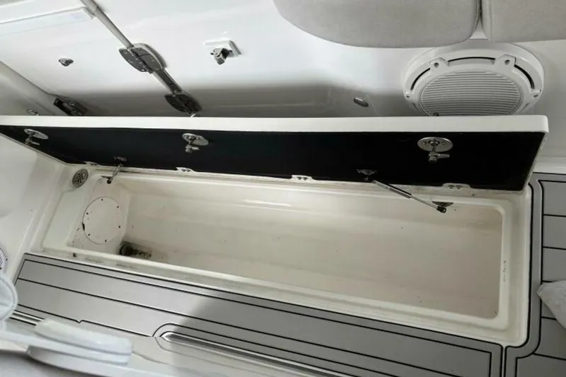  Yacht Photos Pics Open storage compartment on 2021 Sea Fox 288 Commander boat, featuring spacious interior.