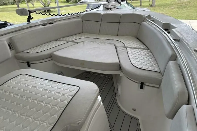  Yacht Photos Pics 2021 Sea Fox 288 Commander boat interior with cushioned seating and modern design.