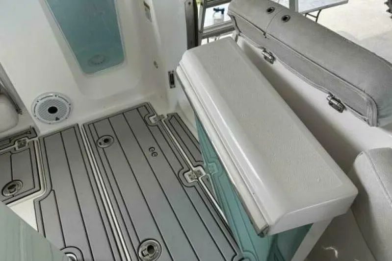  Yacht Photos Pics 2021 Sea Fox 288 Commander boat interior with cushioned seating and non-slip flooring.