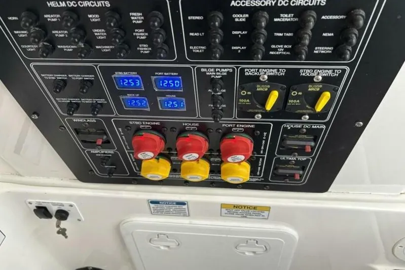  Yacht Photos Pics Control panel of a 2021 Sea Fox 288 Commander boat with various switches and battery indicators.