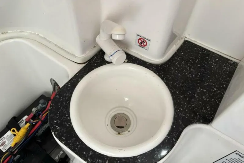  Yacht Photos Pics 2021 Sea Fox 288 Commander boat sink with non-potable water sign.