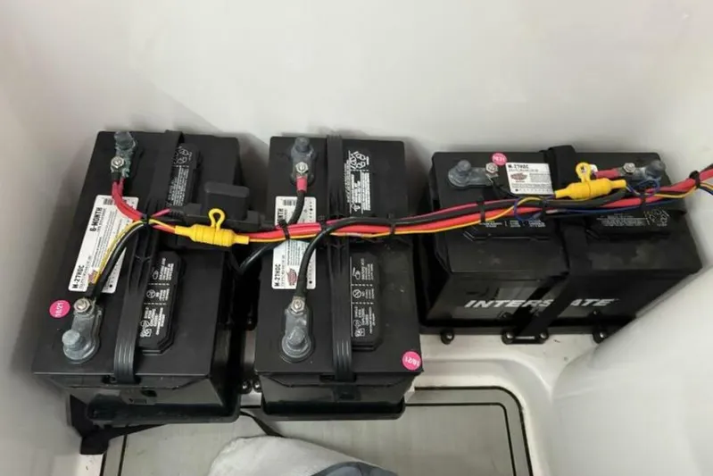  Yacht Photos Pics Batteries installed in a 2021 Sea Fox 288 Commander boat, connected with colored cables.