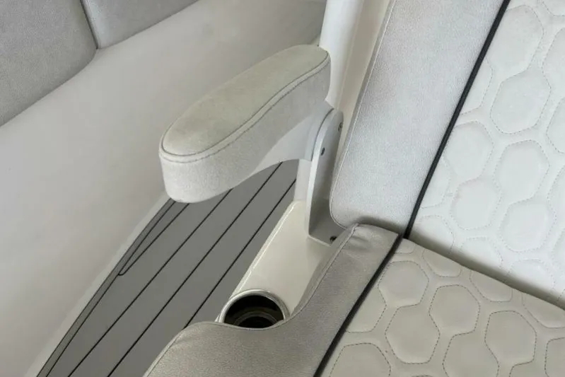  Yacht Photos Pics 2021 Sea Fox 288 Commander boat interior with cushioned seating and armrest.