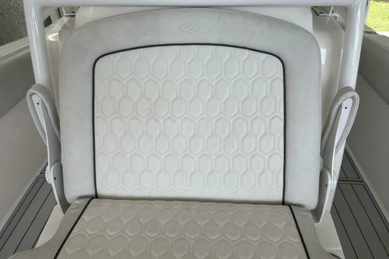  Yacht Photos Pics 2021 Sea Fox 288 Commander boat seat with hexagonal pattern upholstery.