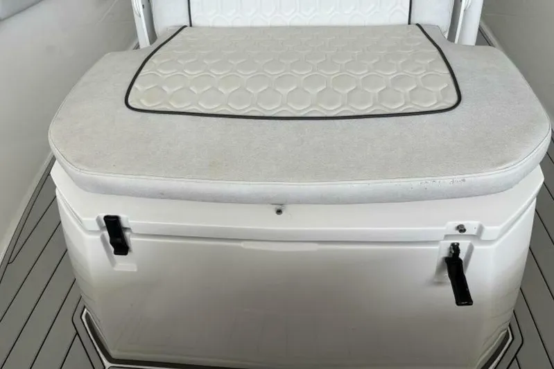 Yacht Photos Pics Padded seat on 2021 Sea Fox 288 Commander boat, featuring hexagonal pattern design.