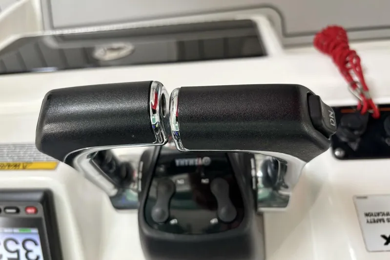  Yacht Photos Pics Close-up of 2021 Sea Fox 288 Commander throttle controls on boat dashboard.