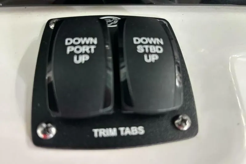 Yacht Photos Pics Trim tab controls on a 2021 Sea Fox 288 Commander boat dashboard.